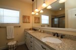 Upstairs En-Suite Master Bathroom with a double sink vanity